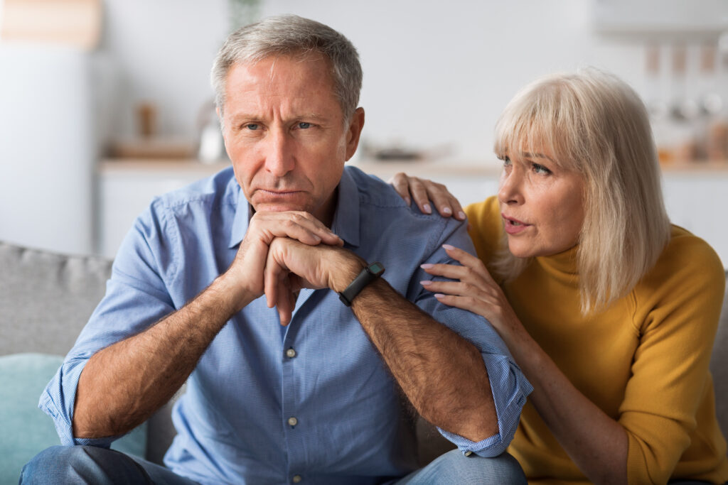 Senior Wife Talking To Indifferent Husband After Conflict At Home